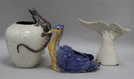 A Studio pottery lizard vase, a model of a cormorant, and a raku whale tail vase height 22cm